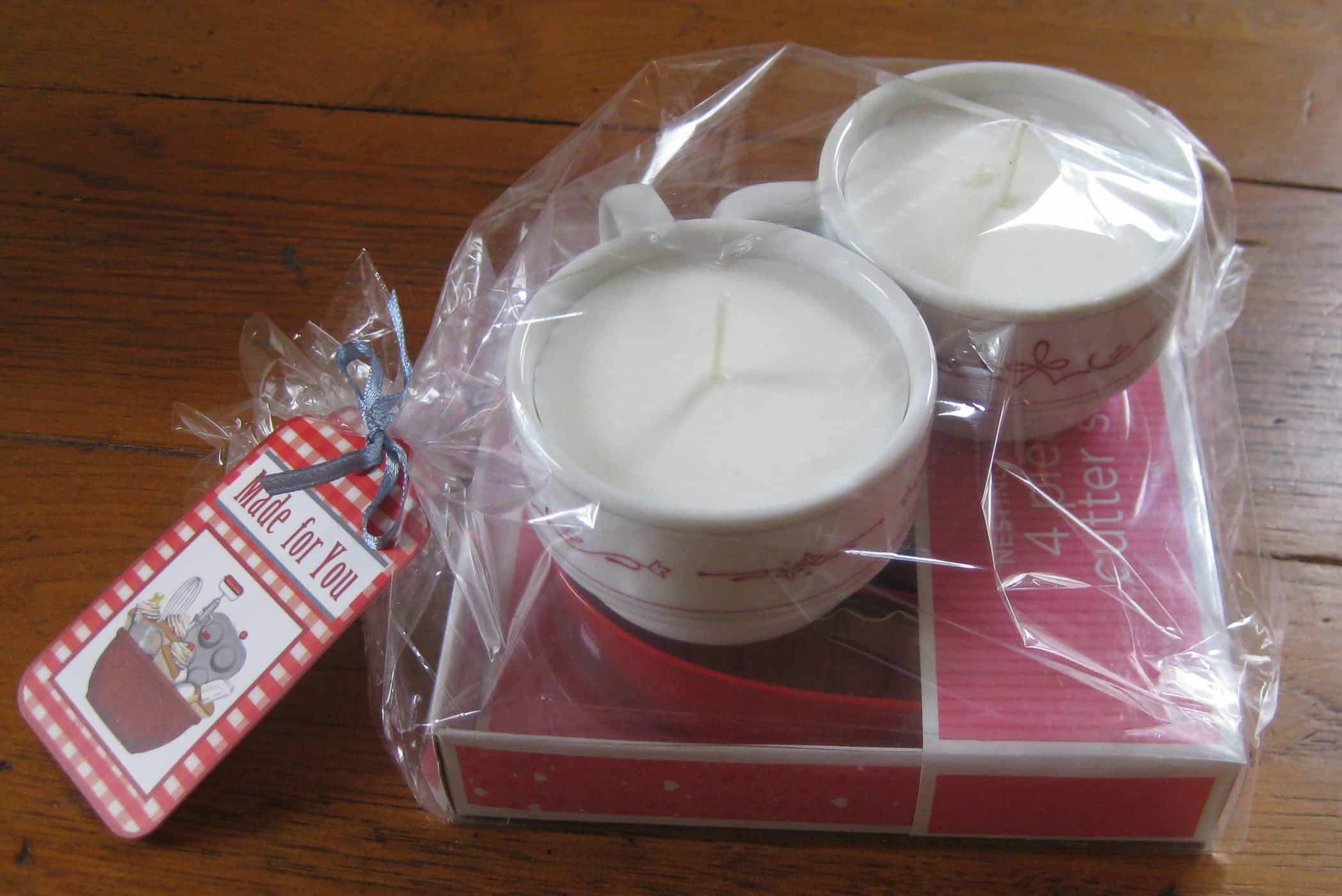 container candles with heart cookie cutter in bag with tag