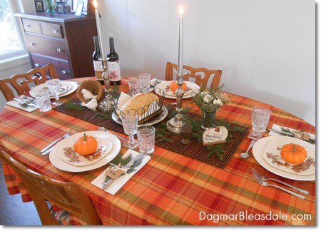 Thanksgiving table setting with silver candles