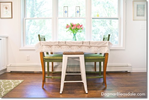 table with chairs and stool in kitchen