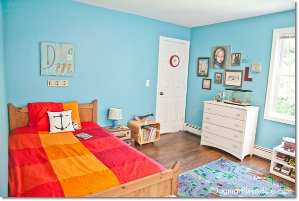 turquoise boy's room with bed and dresser