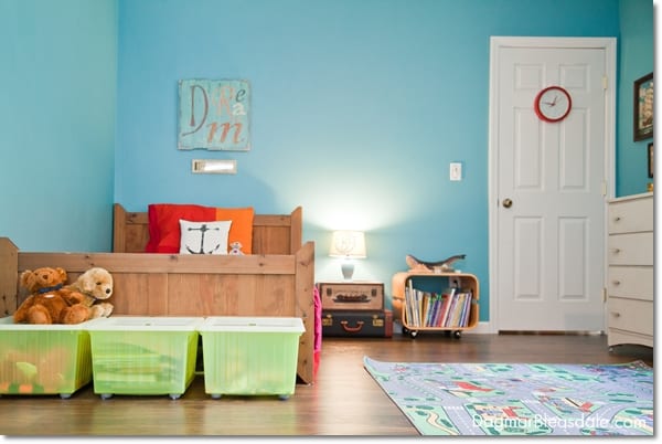 turquoise room, boy's room with bed, dresser, and storage cubes
