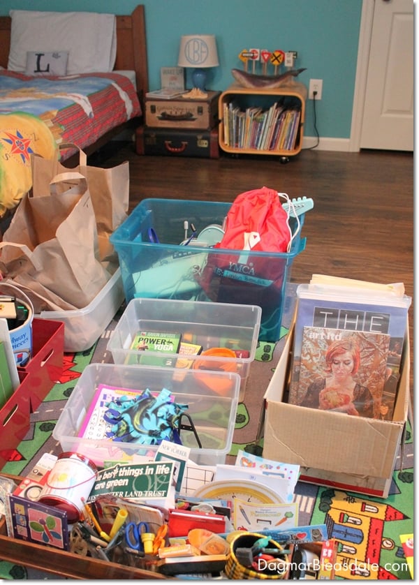 organizing kid's room with bins