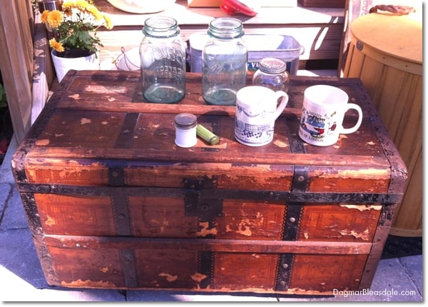 vintage trunk and porch steps full of tag sale finds