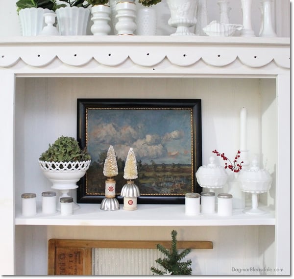 milk glass collection on hutch and winter decor