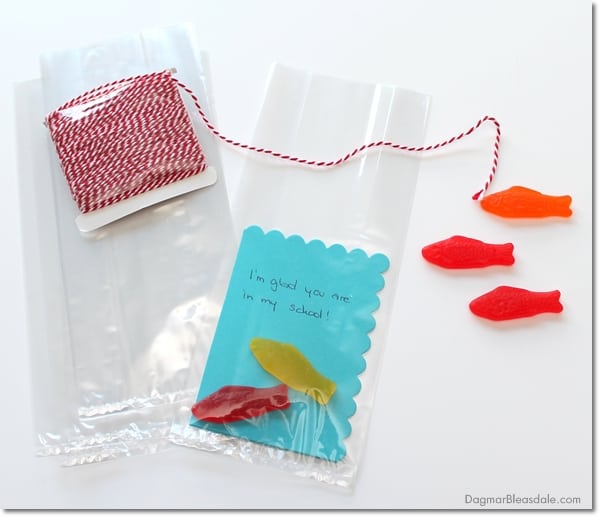 cellophane bags with candy fish and ribbon
