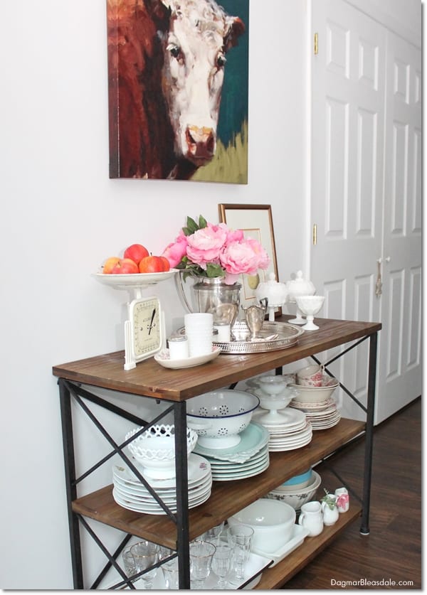 farmhouse console table on wall with dishes