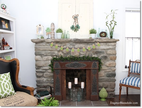 St. Patrick's Day banner on fireplace and other decor in living room