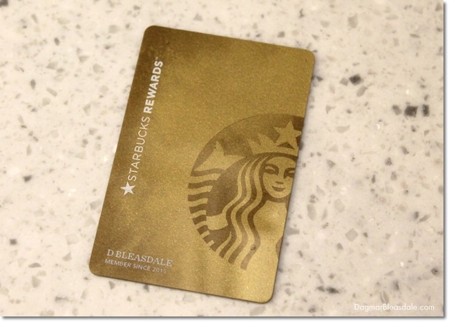 Starbucks gold card on counter