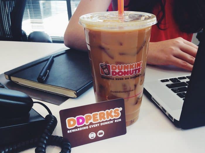 DDPers card and ice coffee, laptop, notebook