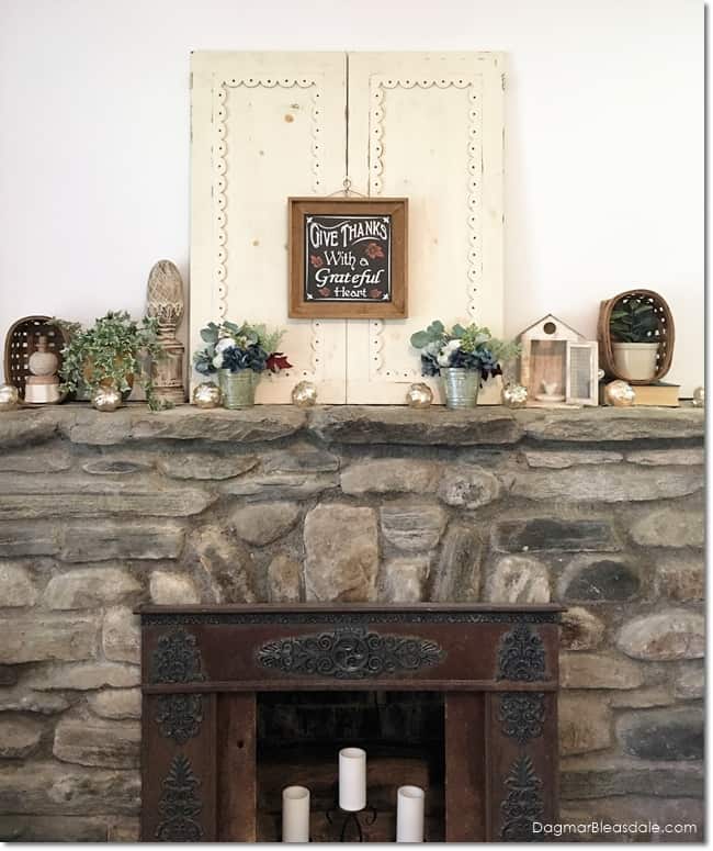 fall mantel decor on stone fireplace with Give thanks sign