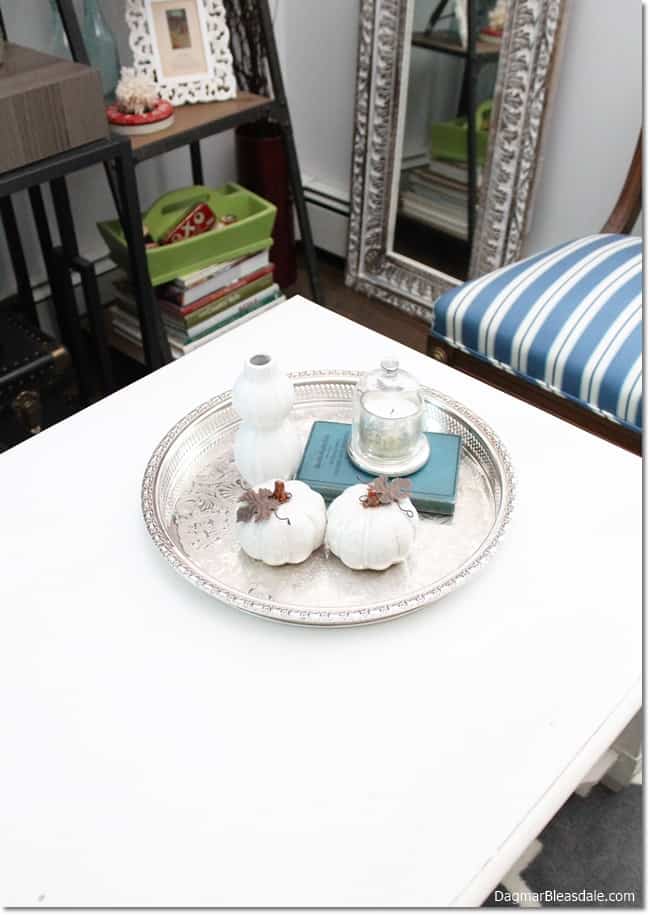 silver tray with decor on white coffee table