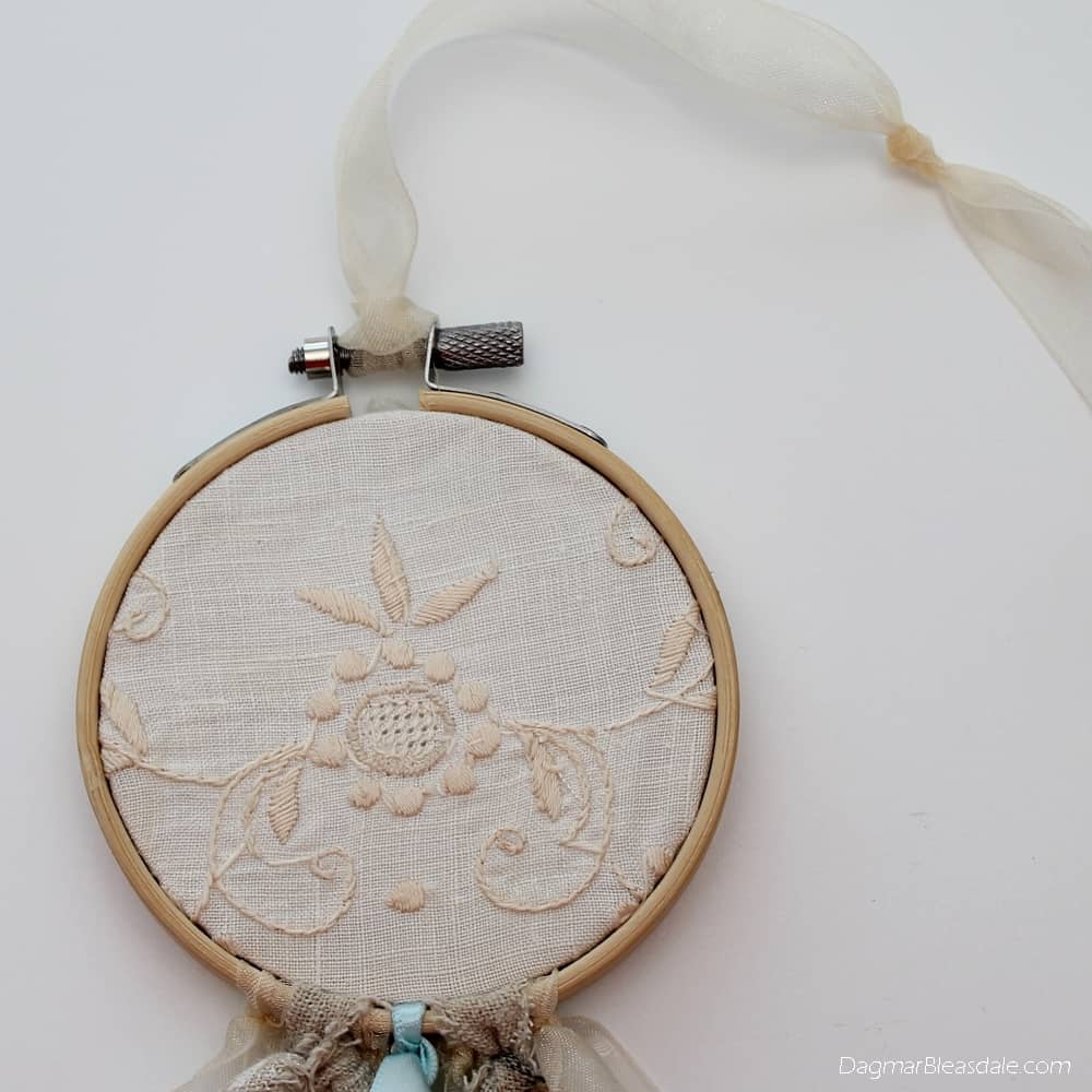 DIY dreamcatcher with lace, embroidery hoop, and ribbons