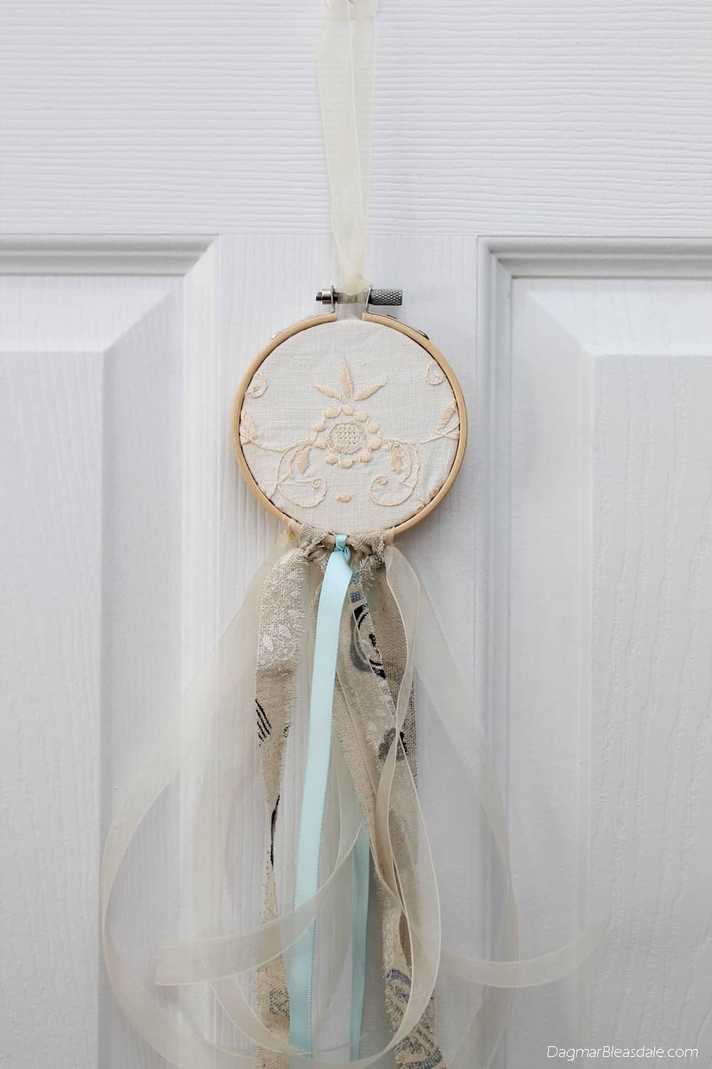 DIY dreamcatcher with lace, embroidery hoop, and ribbons