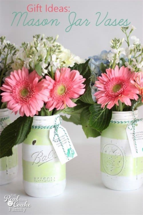 painted mason jars with fake flowers and tags