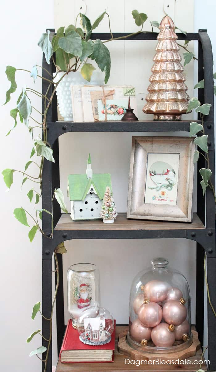 metal shelf with vintage style Christmas decor