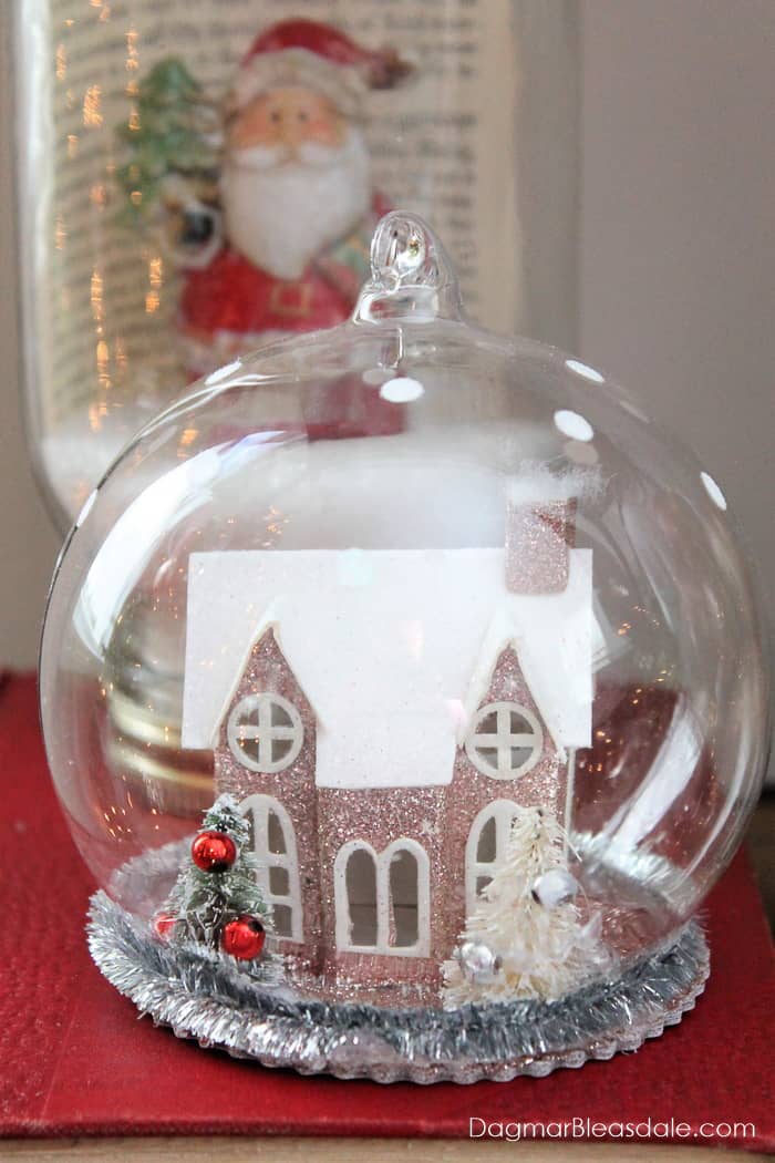 sparkly house in glass dome Christmas decor