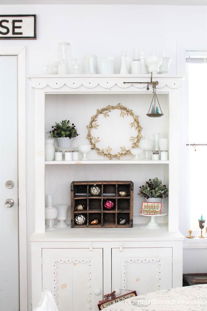 white hutch with milkglass collection and Christmas decor