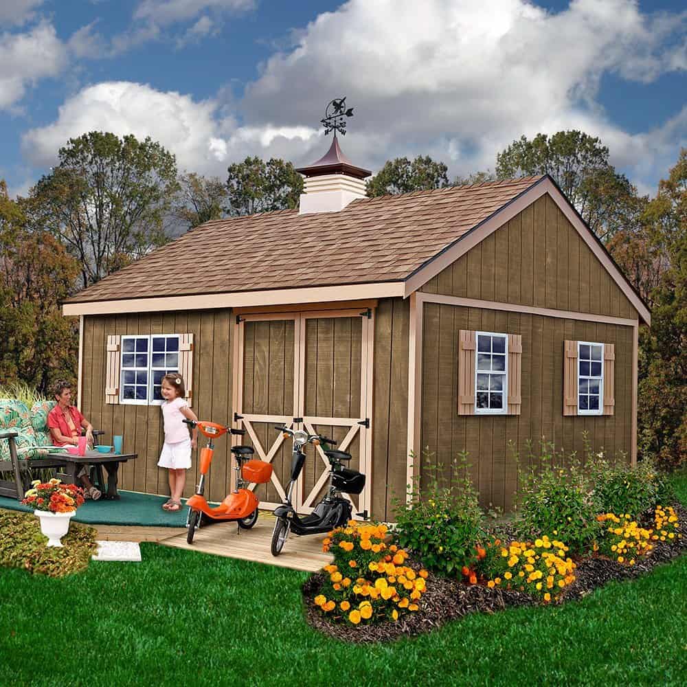 large barn shed in yard with girl and woman in front