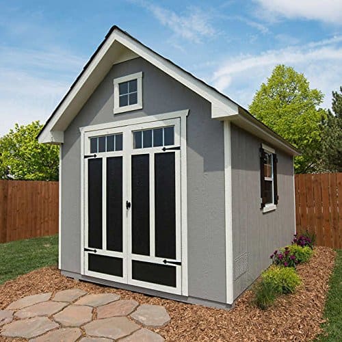gray shed with large doors and windows