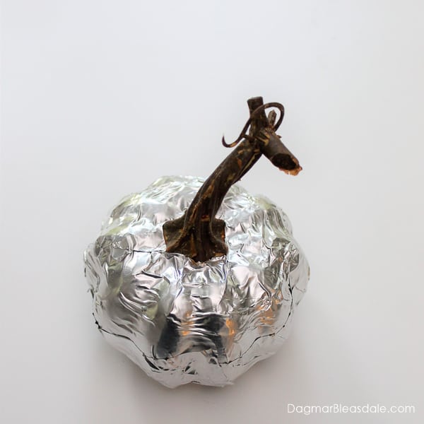 pumpkin made with aluminum foil and plastic pumpkin