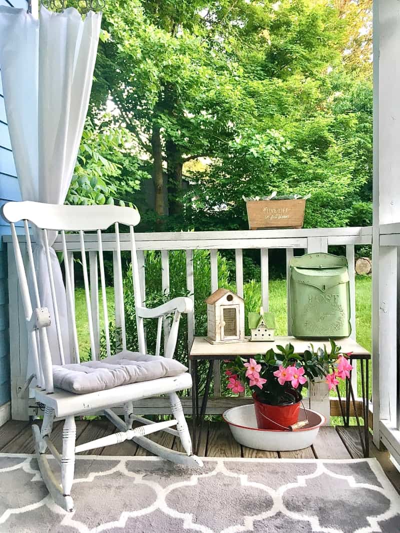 porch with rocking chair and farmhouse decor