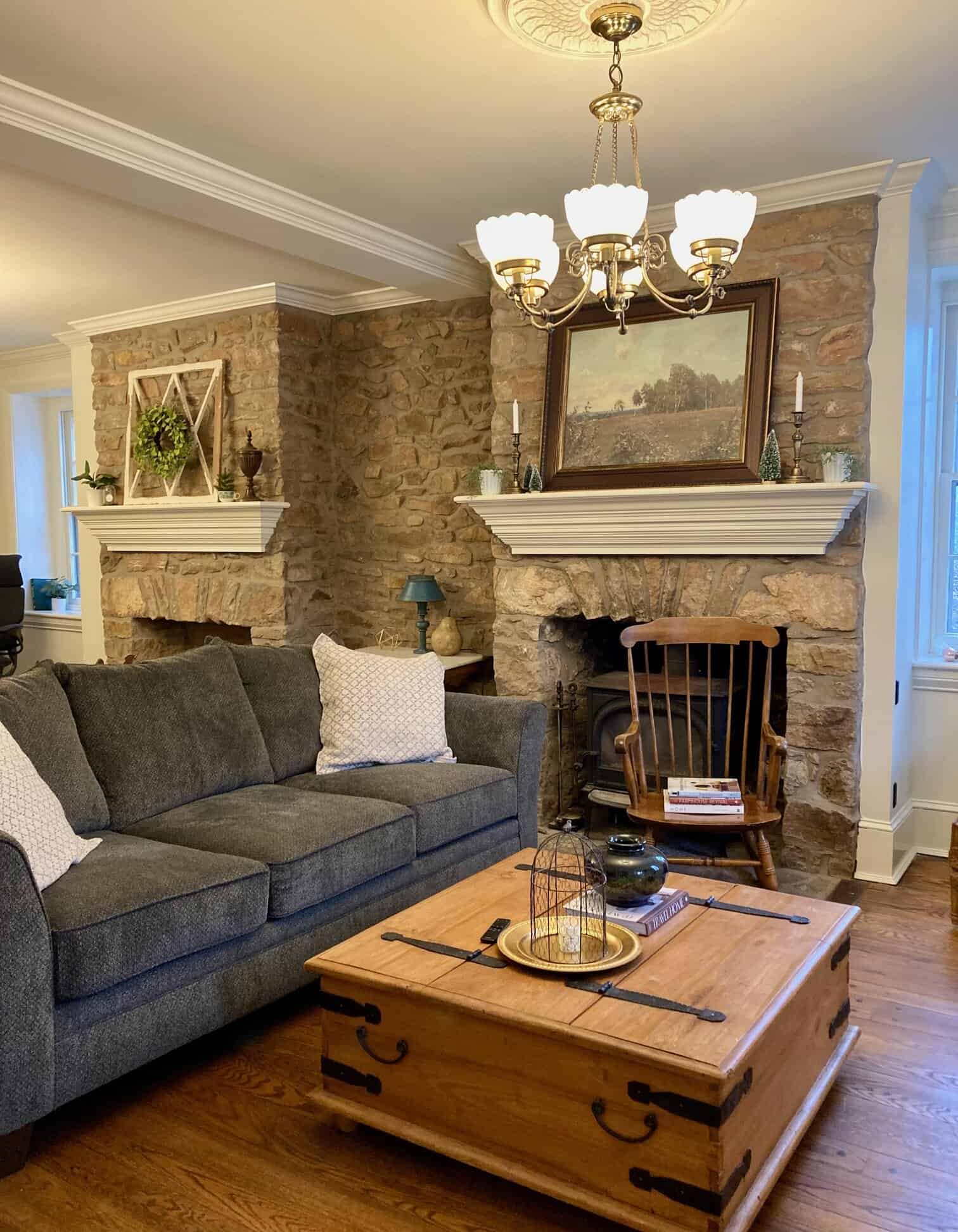 stone manor living room with fireplaces living room in historic home with two fireplaces and stone walls